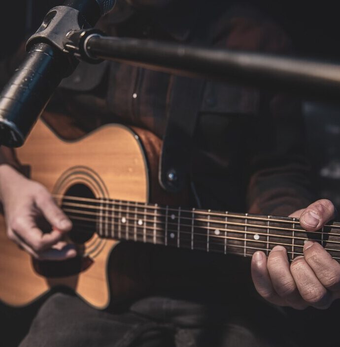 Man playing acoustic guitar