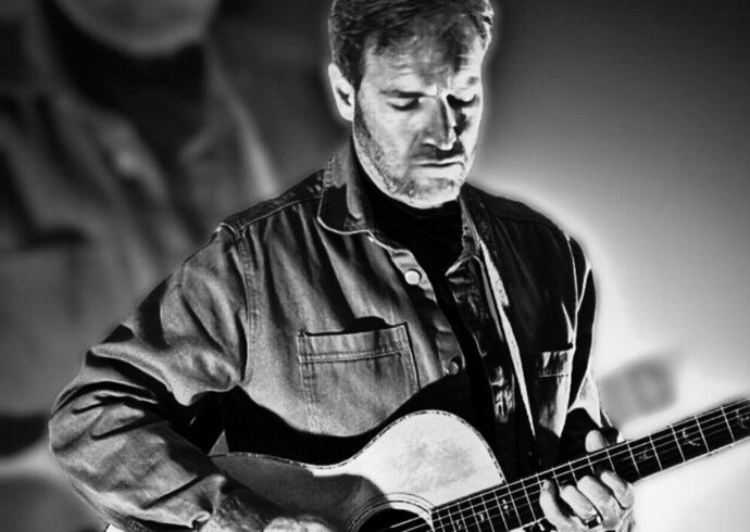 Live music with Kriss Harmony