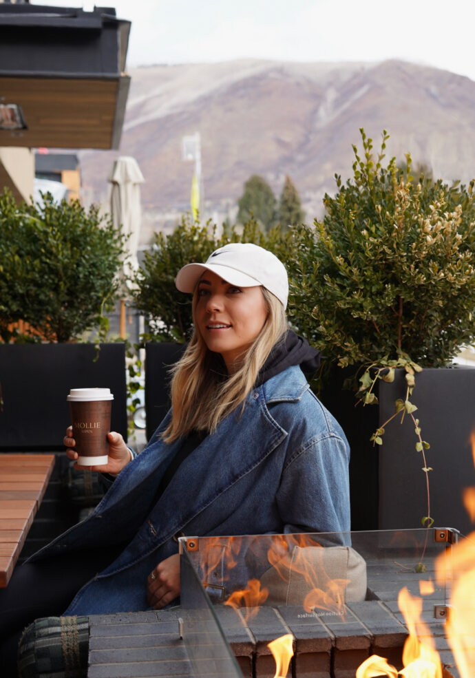 Guest enjoying a coffee on the AM Terrace at MOLLIE Aspen