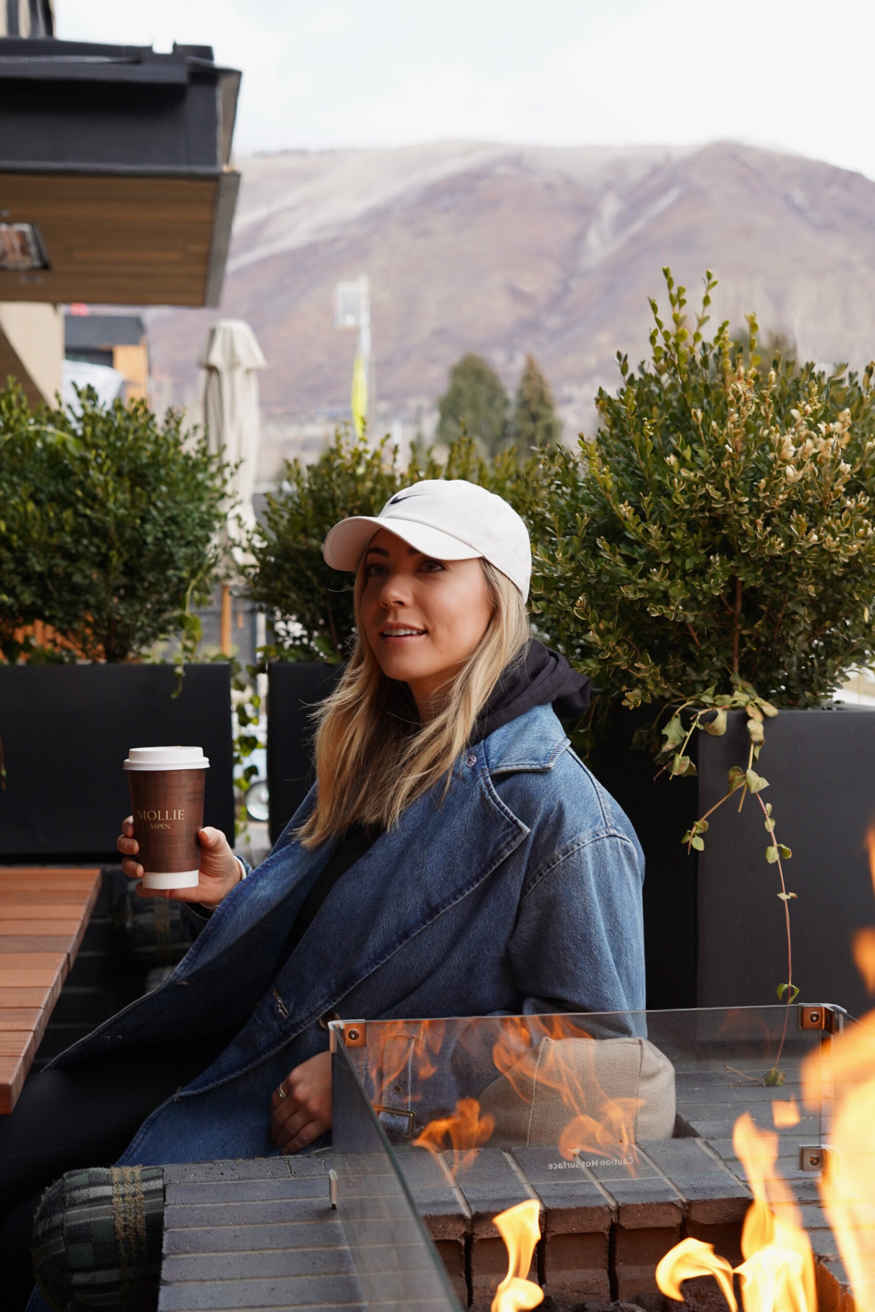 Guest enjoying a coffee on the AM Terrace at MOLLIE Aspen