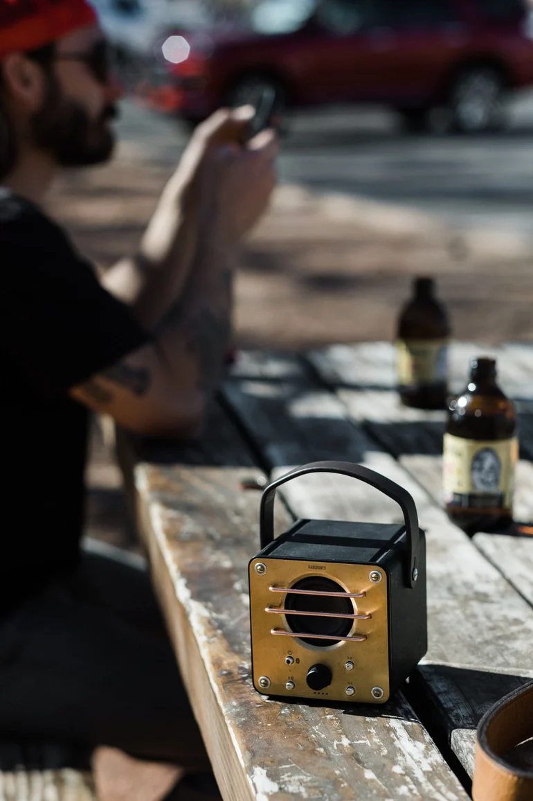 Black Tower Speaker at a picnic table