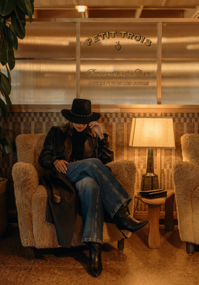 Pam Arias sitting in front of Petit Trois at MOLLIE Aspen