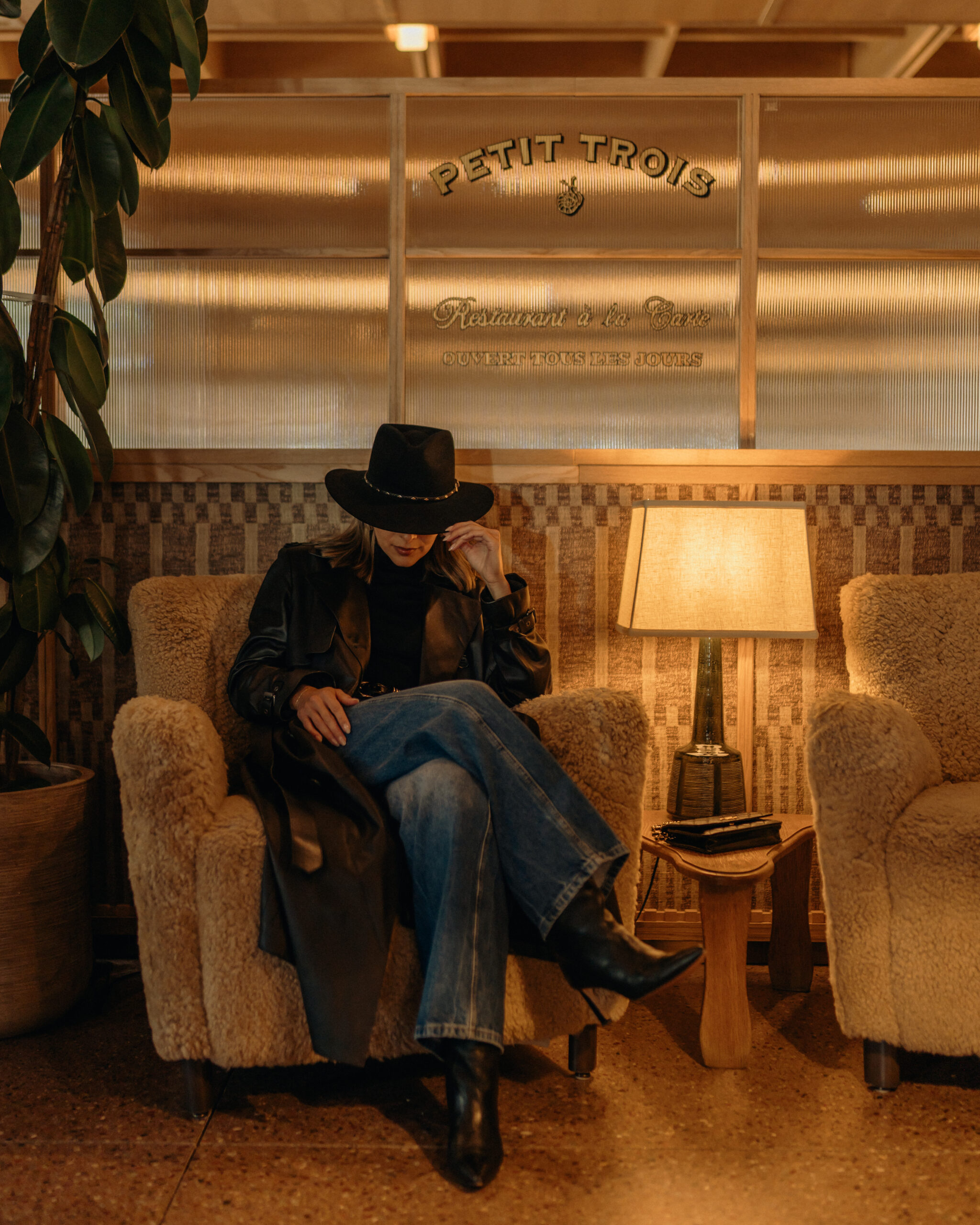 Pam Arias sitting in front of Petit Trois at MOLLIE Aspen