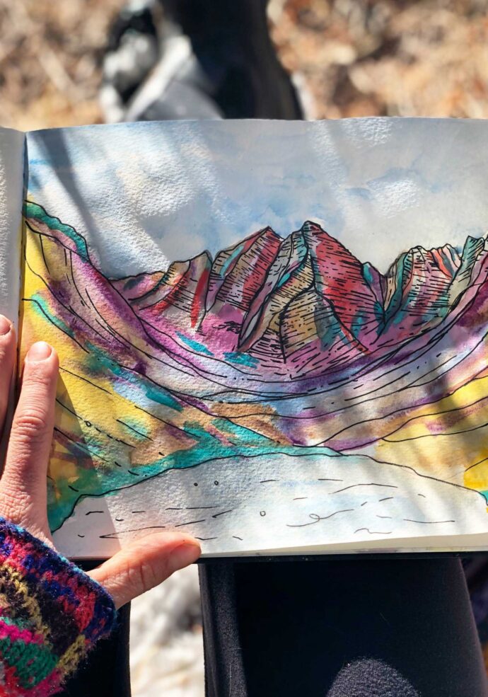Watercolor painting of mountains by artist Sarah Uhl