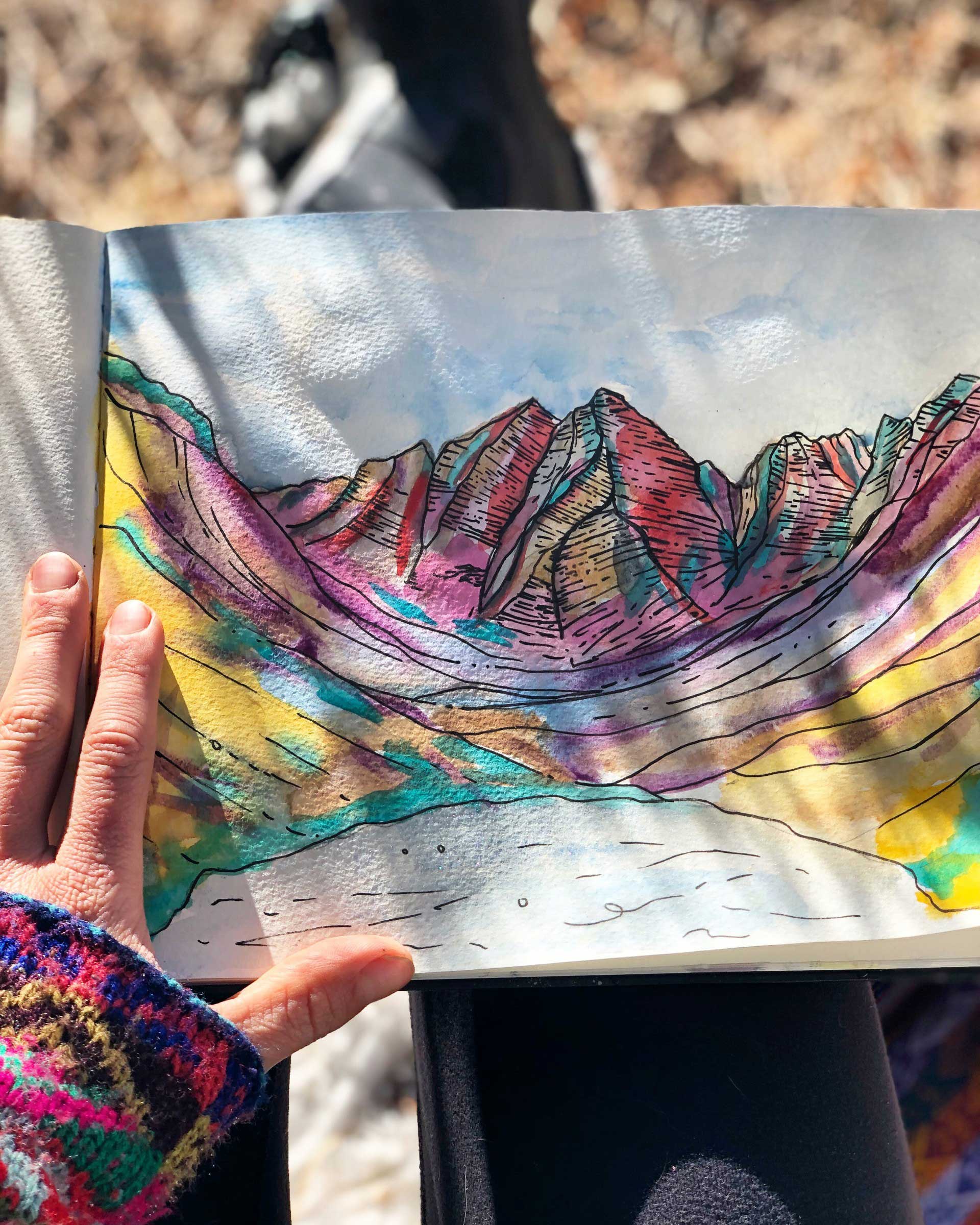 Watercolor painting of mountains by artist Sarah Uhl
