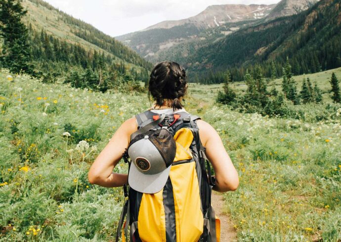 Woman hiking between Aspen and Crested Butte