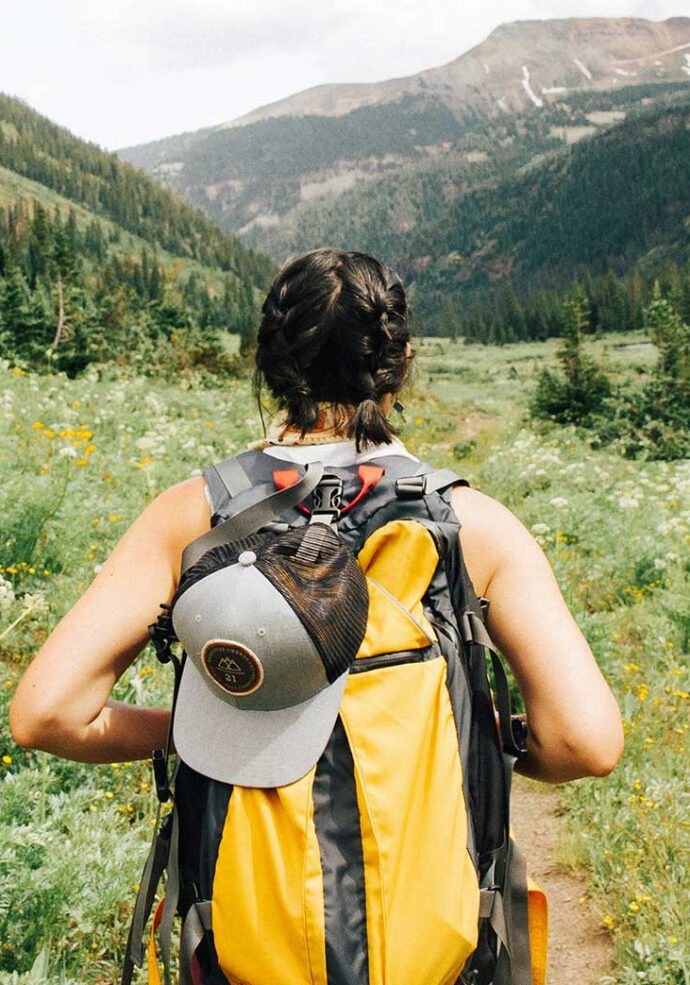 Woman hiking between Aspen and Crested Butte