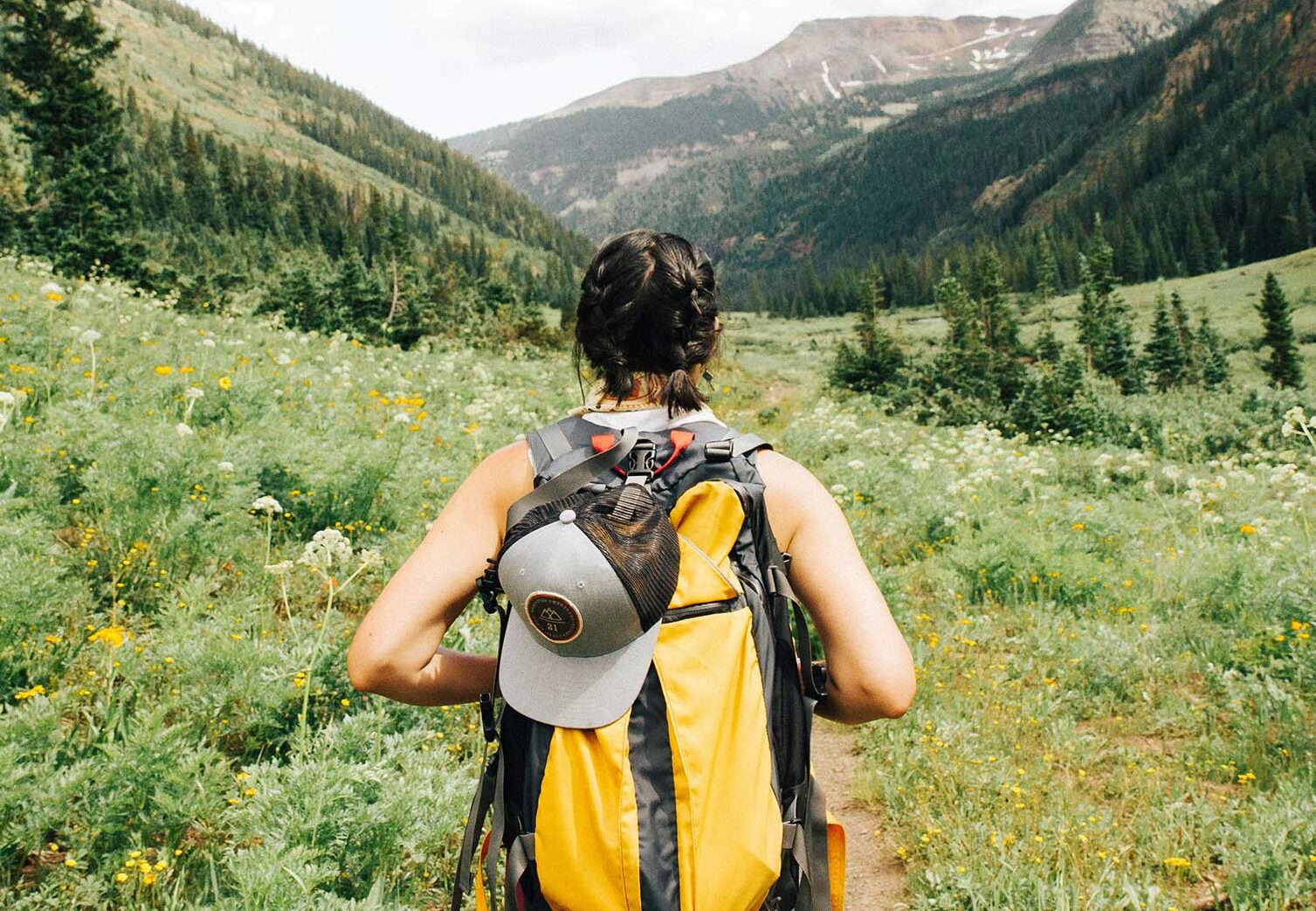 Woman hiking between Aspen and Crested Butte