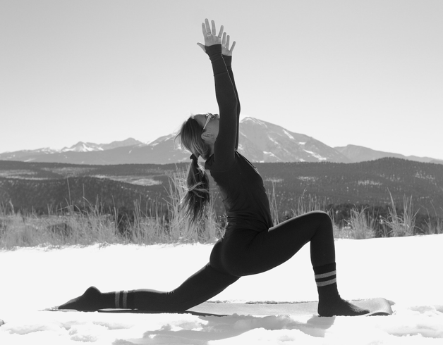 Asspen Collective instructor outside in the snow